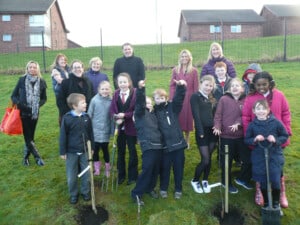 Eco Drama - School Orchards - children planting