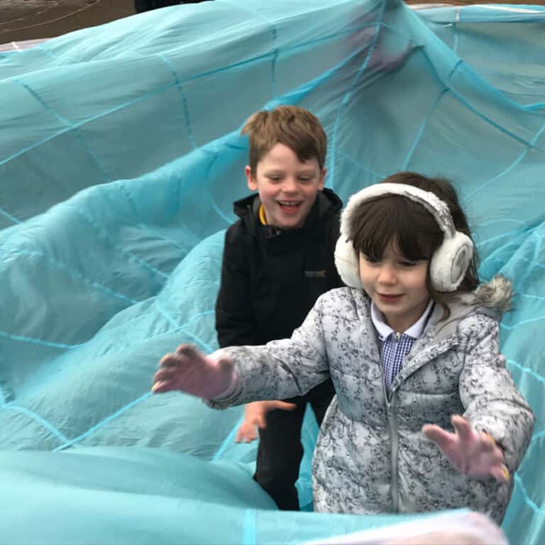 Eco Drama - kids with a parachute
