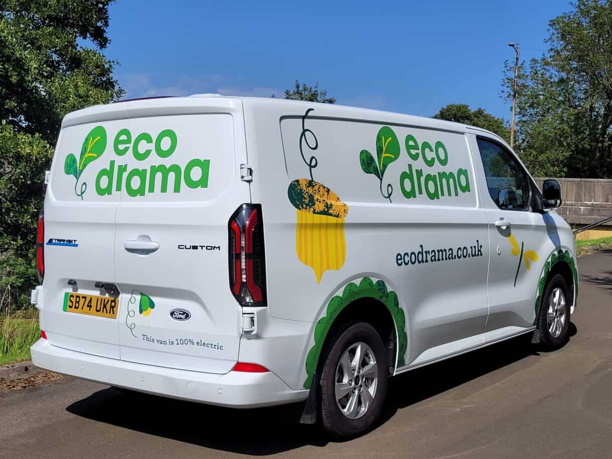 A van with the words eco drama, on it.